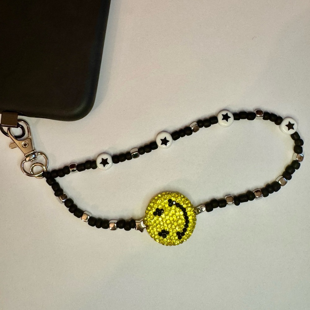 Cell phone wristlet from The Charm Hut works on any phone case